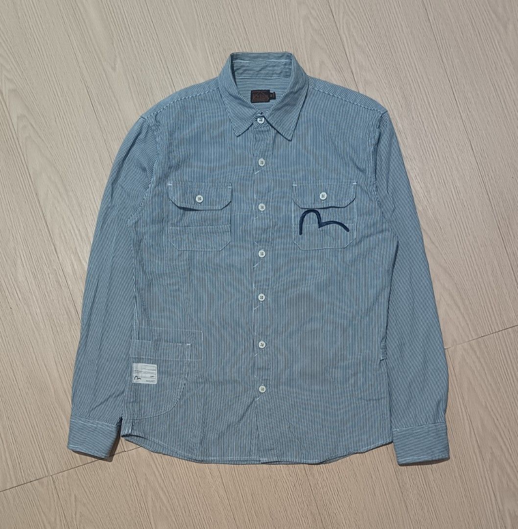 EVISU HICKORY STRIPE WORK WEAR SHIRT (Category: Activewear) located in Cavite. Submitted by marcuz.lifestyle (Listing ID 1462030857, Image 2). Description: WIDTH:19.5 LENGTH:27 EXCELLENT CONDITION NO ISSUE COLOR RATE:9.5/10 MOP:GCASH DELIVERY COURIER:JNT LOCATION:IMUS CAVITE.