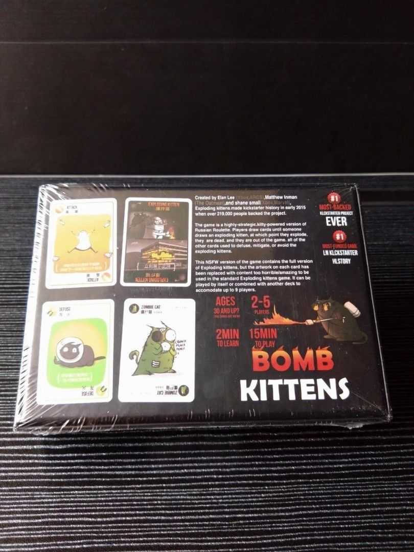 Exploding Kittens NSFW (Category: Board Games & Puzzles) located in Singapore. Submitted by craben (Listing ID 1461814569, Image 2). Description: - Brand new with packaging - Bilingual version - English and Chinese (双语版本 - 英文 跟 华文) Exploding Kittens is a highly strategic, kitty powered version of Russian Roulette. Players take turns drawing cards until someone draws an explodinf kitten and loses the game. The deck is made up of cards that can hel
