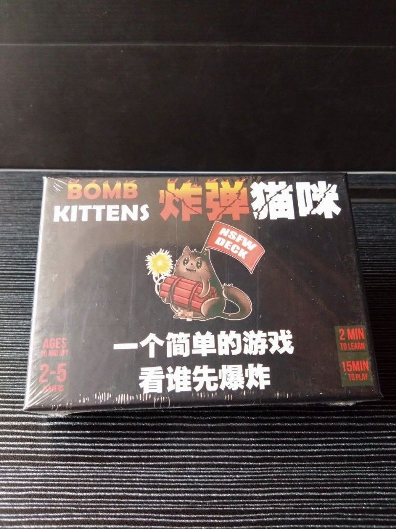 Exploding Kittens NSFW (Category: Board Games & Puzzles) located in Singapore. Submitted by craben (Listing ID 1461814569, Image 1). Description: - Brand new with packaging - Bilingual version - English and Chinese (双语版本 - 英文 跟 华文) Exploding Kittens is a highly strategic, kitty powered version of Russian Roulette. Players take turns drawing cards until someone draws an explodinf kitten and loses the game. The deck is made up of cards that can hel