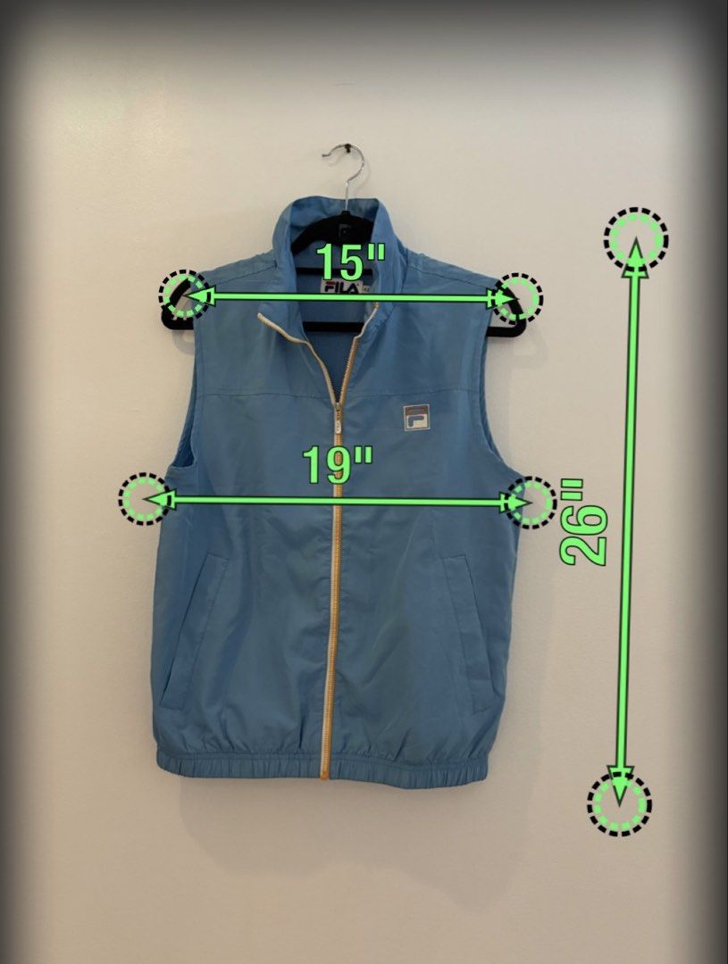 Fila Blue Sleeveless Vest Jacket (Category: Vests) located in Makati City. Submitted by jcalmartz (Listing ID 1461812311, Image 2). Description: - Light blue Fila sports vest - Zip-up front with convenient pockets - Elasticated hem for a snug fit - Measurements: Shoulder width 15", Chest width 19", Length 26".