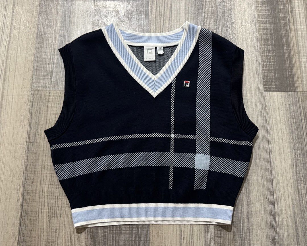 Fila Knit Top (Category: Sleeveless) located in Orani. Submitted by iveecrz (Listing ID 1461836311, Image 1). Description: Size on tag - Small (loose fit) Fits Small to Large.