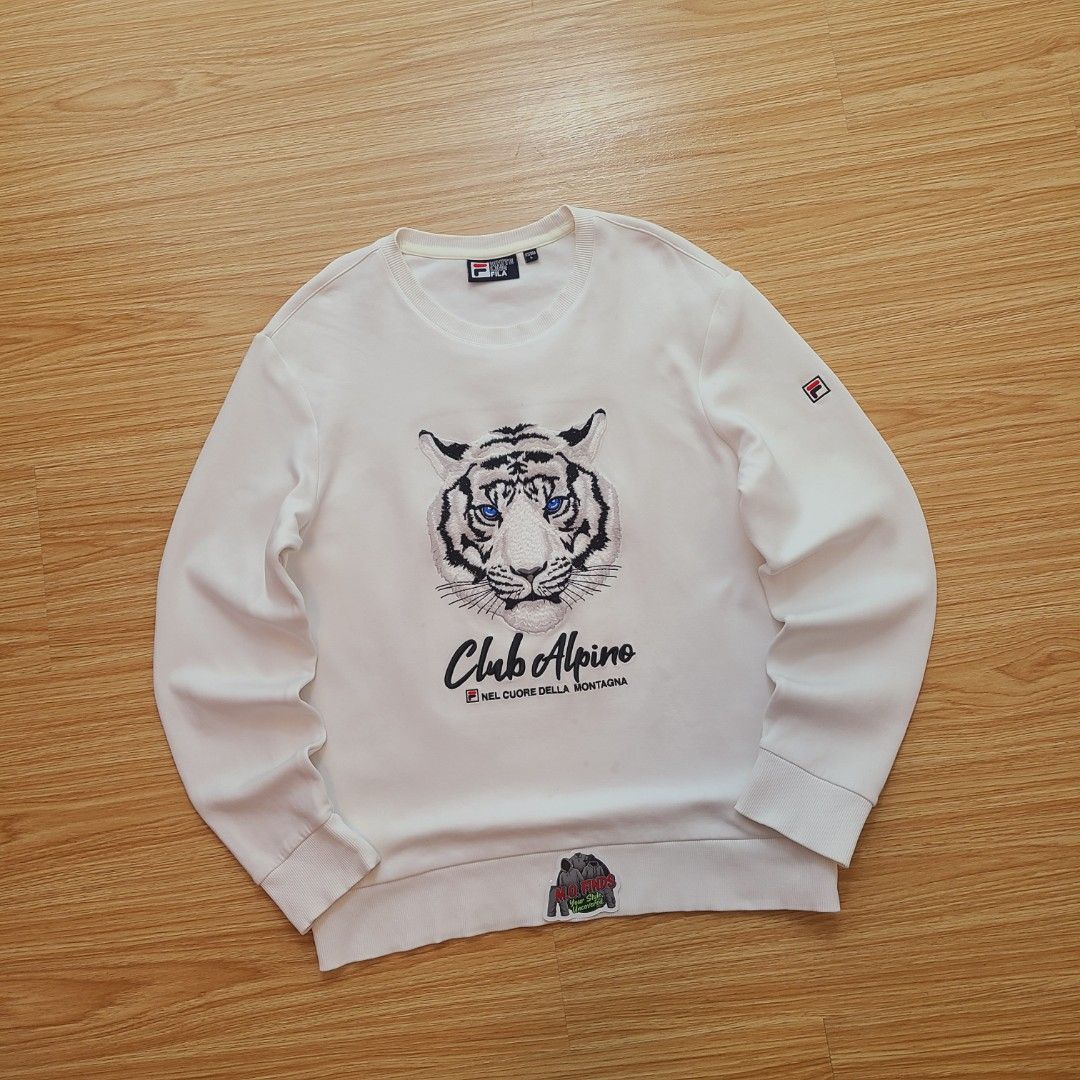 FILA Men's Official Pullover Sweatshirt (Category: Coats, Jackets and Outerwear) located in Quezon City. Submitted by mofinds.ph (Listing ID 1461829811, Image 1). Description: Size: Large Dimes: 22x26 Condition: Excellent/Great condition MOP: BPI DELIVER: LALAMOVE OR J&T MEETUP/PICKUP: Victoria Tower D, Mother Ignacia Ave., Brgy. Paligsahan, Diliman, Quezon City.