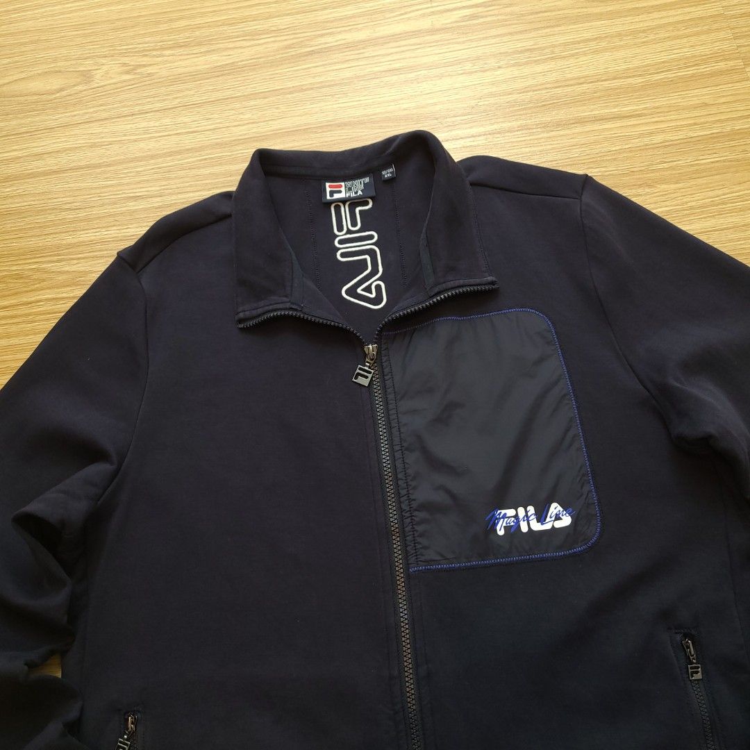 Fila White Line Navy Track Jacket 2XL (Category: Coats, Jackets and Outerwear) located in Quezon City. Submitted by mofinds.ph (Listing ID 1461908646, Image 2). Description: Size: XXL Dimes: 24x29 Condition: Excellent/Great condition MOP: BPI DELIVER: LALAMOVE OR J&T MEETUP/PICKUP: Victoria Tower D, Mother Ignacia Ave., Brgy. Paligsahan, Diliman, Quezon City.