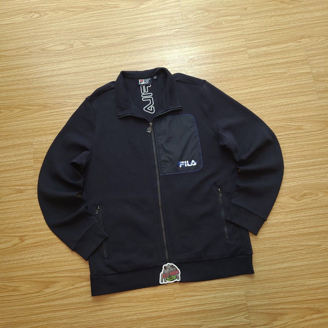 Fila White Line Navy Track Jacket 2XL (Category: Coats, Jackets and Outerwear) located in Quezon City. Submitted by mofinds.ph (Listing ID 1461908646, Image 1). Description: Size: XXL Dimes: 24x29 Condition: Excellent/Great condition MOP: BPI DELIVER: LALAMOVE OR J&T MEETUP/PICKUP: Victoria Tower D, Mother Ignacia Ave., Brgy. Paligsahan, Diliman, Quezon City.