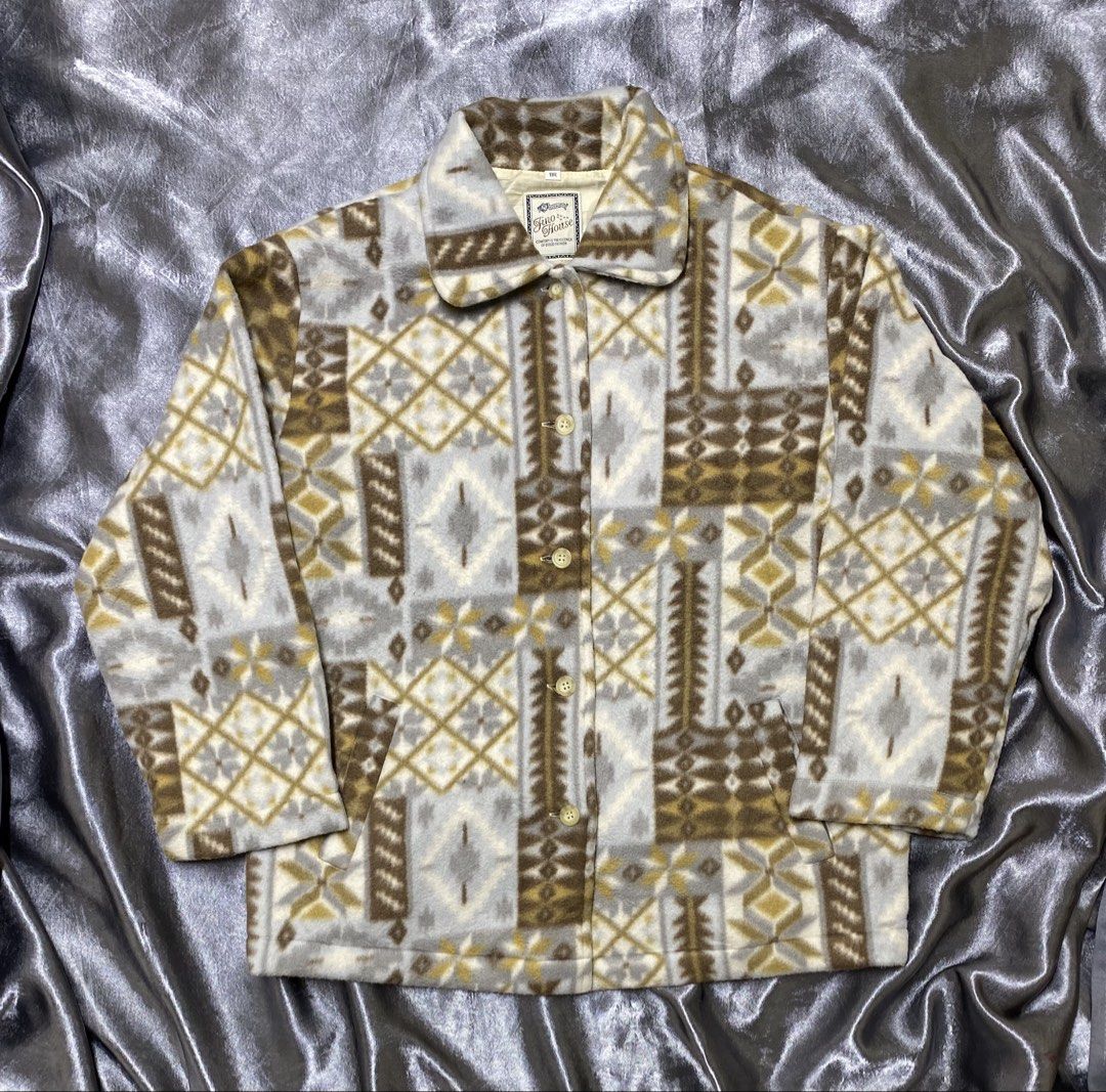 Fino House Fleece Jacket - Geometric Pattern (Category: Coats, Jackets and Outerwear) located in Agdangan. Submitted by kevinthriftshop (Listing ID 1461946667, Image 1). Description: - Cozy fleece jacket from Fino House - Features a stylish geometric pattern in brown, grey, and cream - Button-up front with two convenient pockets - Tag size: 11R - Material: 100% Polyester - Ideal for layering to stay warm.