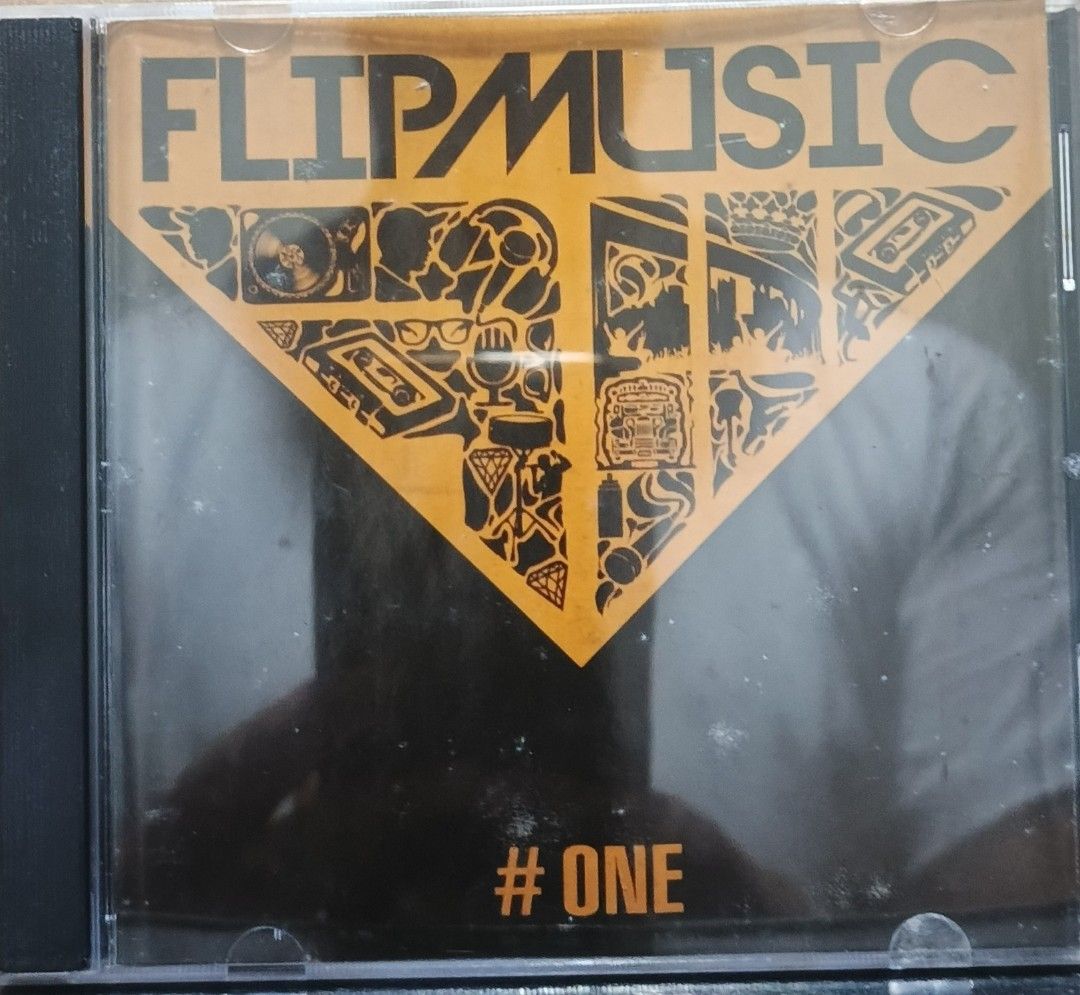 Flip Music #One Compilation CD (Category: CDs & DVDs) located in Manila. Submitted by ruelcabrer77078 (Listing ID 1461966358, Image 1). Description: - Flip Music #One Compilation CD - Released in 2013 - Features various artists including Blaze N' Kane, Pow Chavez, Shehyee, Juan Tamad, Thyro, and more. - Perfect collection for music enthusiasts..