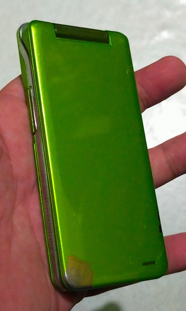 Flip-Phone (Category: Other Gadgets) located in Manila. Submitted by elilee_80 (Listing ID 1461970754, Image 3). Description: FOR SALE! TOSHIBA KDDi (Flip-Phone) Yellow Green With Flash (DIGICAM Alternative) ISSUE: Hindi pa Open-line/ Paint Chipping Imported and made in japan In good working condition AS-IS! 1,500php PAYMENT: Gcash/Cebuana SHIPPING: LBC/ J&T PICKUP: Lalamove/Grab/Mr.Speedy/Tok-Tok! MEETUP: SM angono.