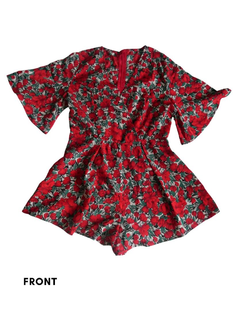 Floral V-Neck Romper with Flared Sleeves (Category: Rompers) located in Mandaluyong City. Submitted by heyhellohayes (Listing ID 1461972059, Image 2). Description: - Adorable red and green floral print romper - Flattering V-neck design - Stylish flared sleeves - Lightweight fabric, ideal for hot weather - Convenient back zipper for easy dressing - Versatile for casual outings or beach trips - Pairs well with sandals or sneakers 📸 Check the poste