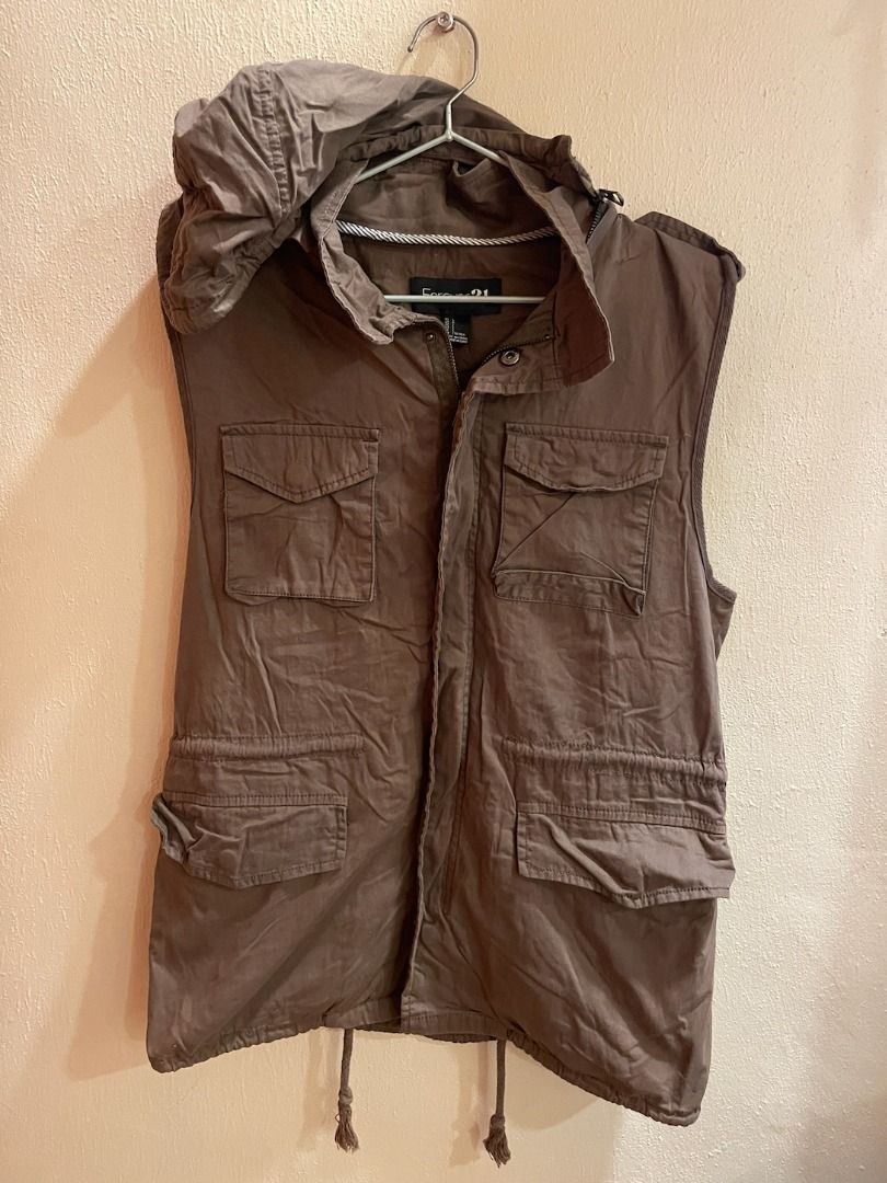 Forever 21 Hooded Utility Vest (Category: Coats, Jackets and Outerwear) located in Quezon City. Submitted by kiarampang60581 (Listing ID 1461798046, Image 1). Description: - Brand: Forever 21 - Type: Hooded Utility Vest - Color: Brown / Khaki - Size: L - Features: Drawstring waist, drawstring hem, sleeveless design - Closure: Zipper and button Feel free to message me for more details about the item! Loc: Culiat, Quezon City, Metro Manila MOP: GCa