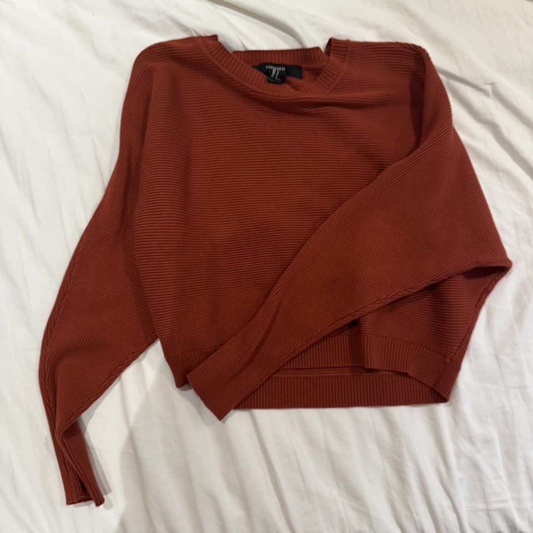 Forever 21 rust sweater (Category: Longsleeves) located in Muntinlupa City. Submitted by champange101 (Listing ID 1461847230, Image 1). Description: Pre loved! No issues. Size is in the photo No when worn photos.