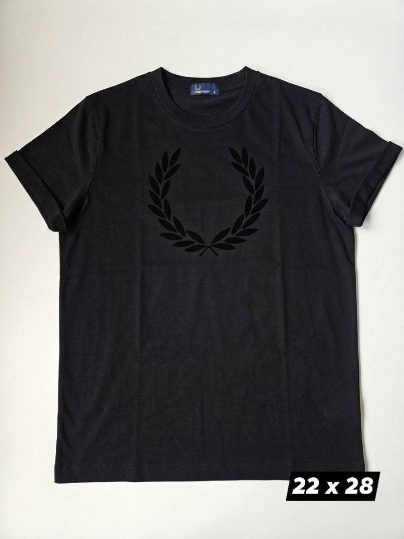 Fred Perry Black T-Shirt Size L (Category: Tshirts & Polo Shirts ) located in Quezon City. Submitted by rezno (Listing ID 1462016392, Image 1). Description: - Brand: Fred Perry - Color: Black - Size: XL (Tag) - Measurements: 22 inches (width) x 28 inches (length) - Material: 100% Cotton - Features: Iconic black laurel wreath logo - Style: Simple, classic, versatile staple piece.