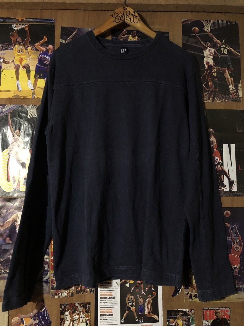 GAP Long Sleeve Shirt (Category: Tshirts & Polo Shirts ) located in Manila. Submitted by bakithrift213 (Listing ID 1461851369, Image 1). Description: - Classic navy blue long sleeve shirt from GAP - Simple crew neck design - Comfortable and versatile - Perfect for layering or wearing on its own - Ideal for casual wear.