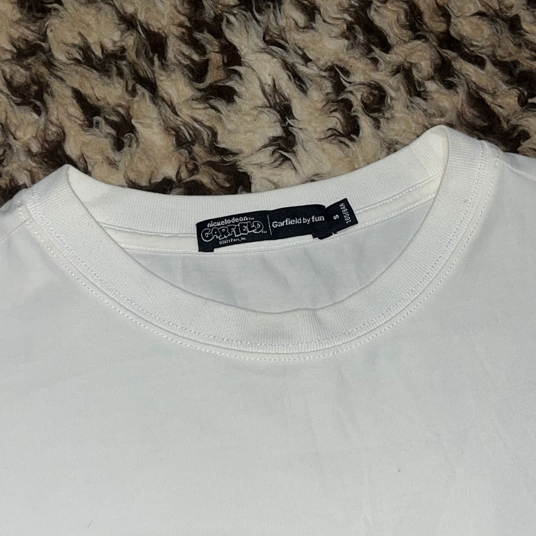 GARFIELD T SHIRT (Category: Tshirts & Polo Shirts ) located in Quezon. Submitted by ejay.thrift.clothes (Listing ID 1462007485, Image 2). Description: SMALL 20 X 26 NO ISSUE COLOR RATE: 10/10 AS NEW CONDITION # 499.