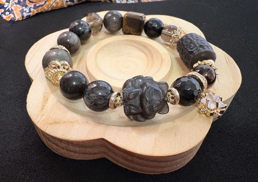 Gemstone bracelet (Category: Bracelets) located in Manila. Submitted by charliesxcharms (Listing ID 1461805862, Image 2). Description: Silver obsidian fox and lucky turn, tiger eye, black rutile, pyrite .