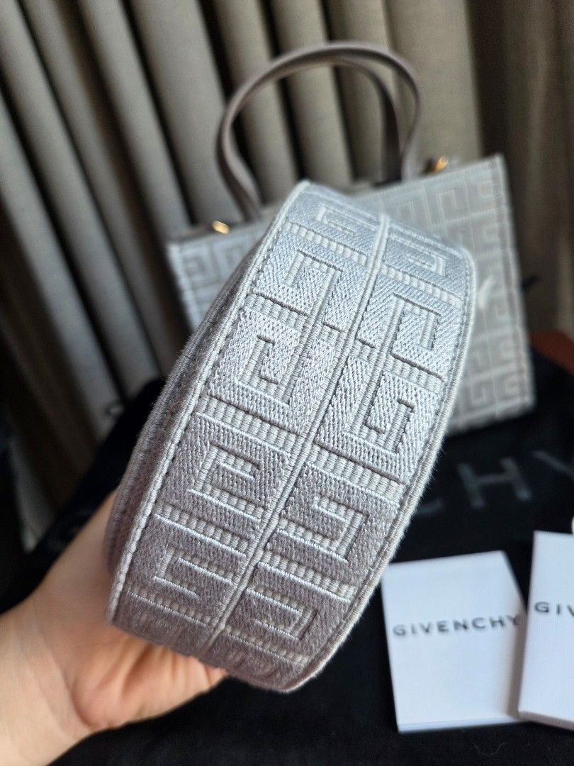 Givenchy Mini G-Tote (Category: Luxury Bags & Wallets) located in Quezon City. Submitted by shop.mar.go (Listing ID 1461858309, Image 3). Description: unused comes with dust bag, care card & legitgrails givenchy mini g-tote stone gray color.