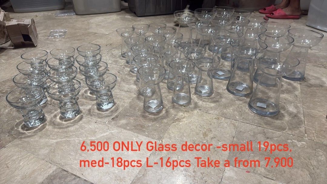 Glass Decor Vases - Small, Medium, Large Set (Category: Vases & Decorative Bowls) located in Taguig. Submitted by firesale123 (Listing ID 1461824210, Image 1). Description: - Set of 53 glass decor vases - Includes: 19 small, 18 medium, 16 large pieces - Ideal for events and home styling - Original individual prices shown in photos - Special bundle price: P7,900 for all 53 pieces.