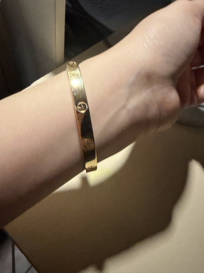 Gold Love Bracelet (Category: Bracelets) located in Quezon City. Submitted by mmauthenticshop (Listing ID 1461866516, Image 2). Description: 18k yellow gold Screw type 9.1grams 7.5k per gram - Classic gold bracelet - Features elegant screw details - Timeless and versatile design - Secure clasp closure - Ideal for everyday wear or special occasions - Will be packed securely for shipping.