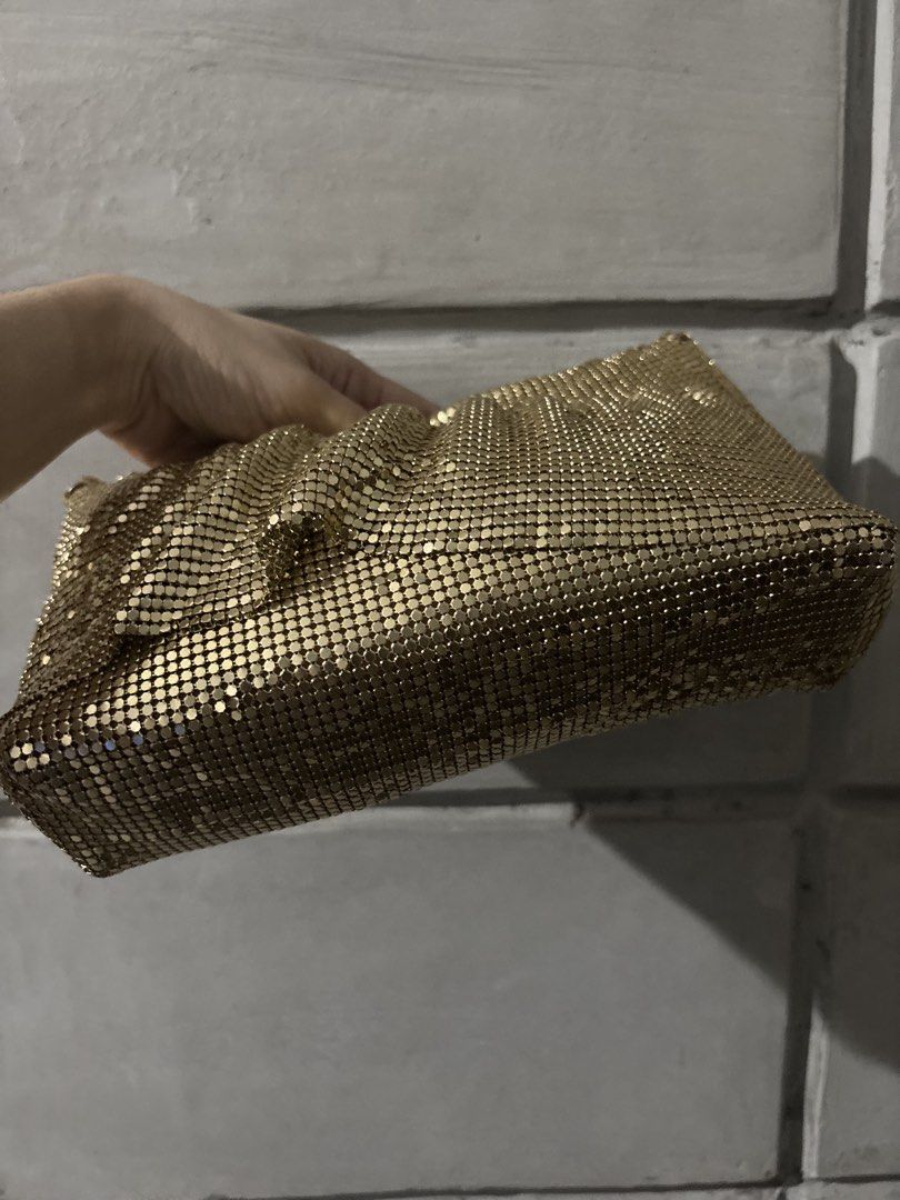 Gold Mesh Evening Clutch Bag (Category: Clutches) located in Caloocan City. Submitted by shopmyclosetttttt (Listing ID 1461892293, Image 3). Description: - Sparkly gold mesh clutch - Ideal for parties and nights out - Drapes beautifully - Fits essentials (phone, keys, lipstick) - Secure zipper closure - Adds a touch of glam to any outfit.
