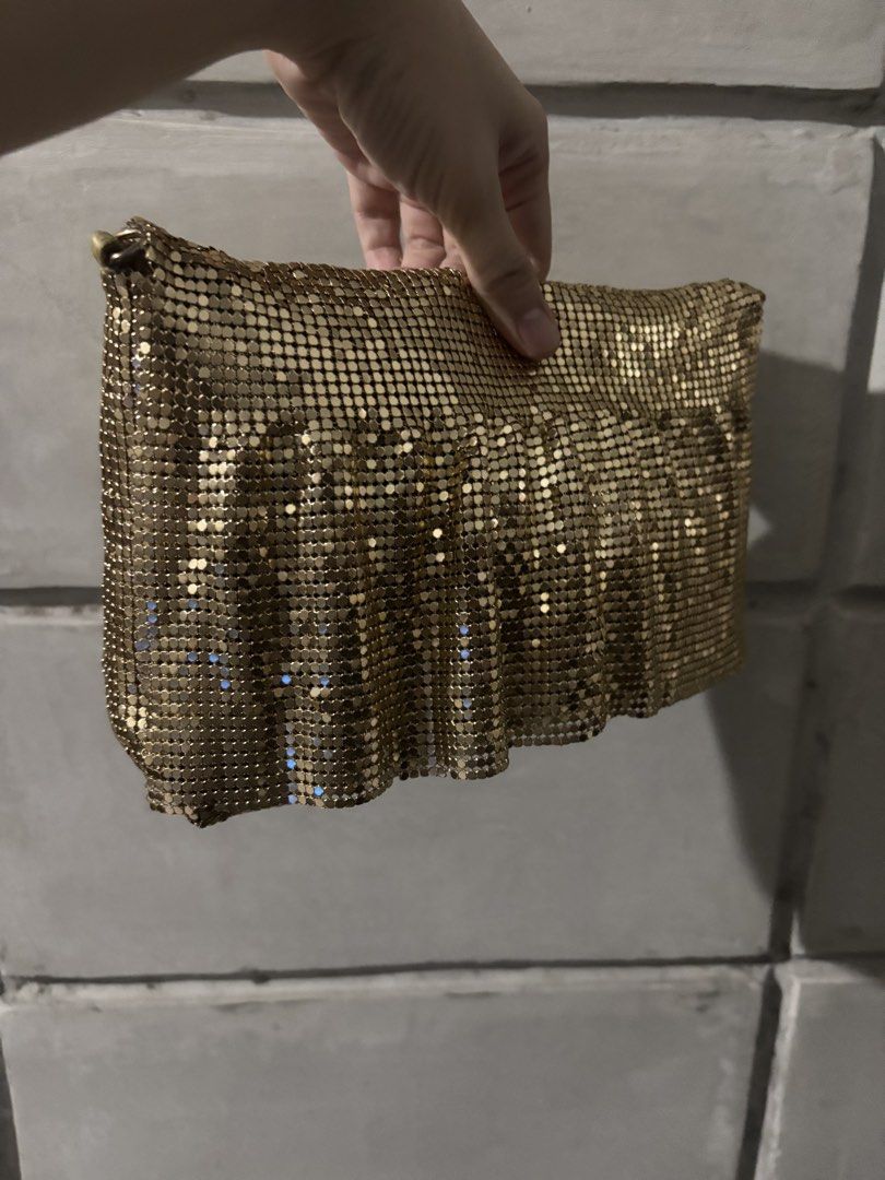Gold Mesh Evening Clutch Bag (Category: Clutches) located in Caloocan City. Submitted by shopmyclosetttttt (Listing ID 1461892293, Image 2). Description: - Sparkly gold mesh clutch - Ideal for parties and nights out - Drapes beautifully - Fits essentials (phone, keys, lipstick) - Secure zipper closure - Adds a touch of glam to any outfit.