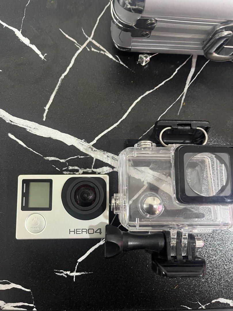 GoPro HERO4 Action Camera with Waterproof Case (Category: Cameras) located in Manila. Submitted by senoritaleng (Listing ID 1461883867, Image 1). Description: - GoPro HERO4 camera - Includes waterproof casing - No charger - With SD card - Comes with a mount - Ideal for adventures and capturing memories - Ready for your next trip!.