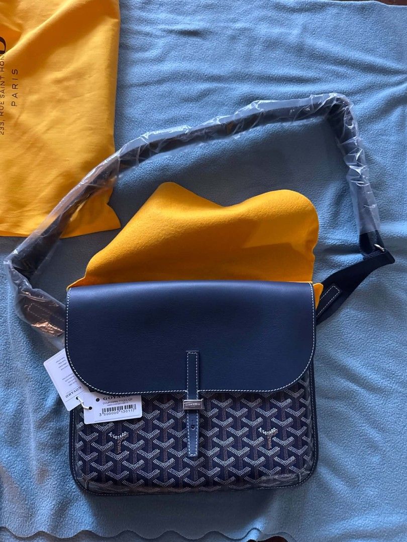 Goyard Coursier (Category: Luxury Bags & Wallets) located in Makati City. Submitted by chezcaii (Listing ID 1461809303, Image 2). Description: - Authentic Goyard shoulder bag - Color: blue - Includes: Dust bag, paper bag, original packaging - Condition: unused; Hardware still has protective plastic FS w/in MM; meet-up in BGC/makati area MOP: BDO/BPI.
