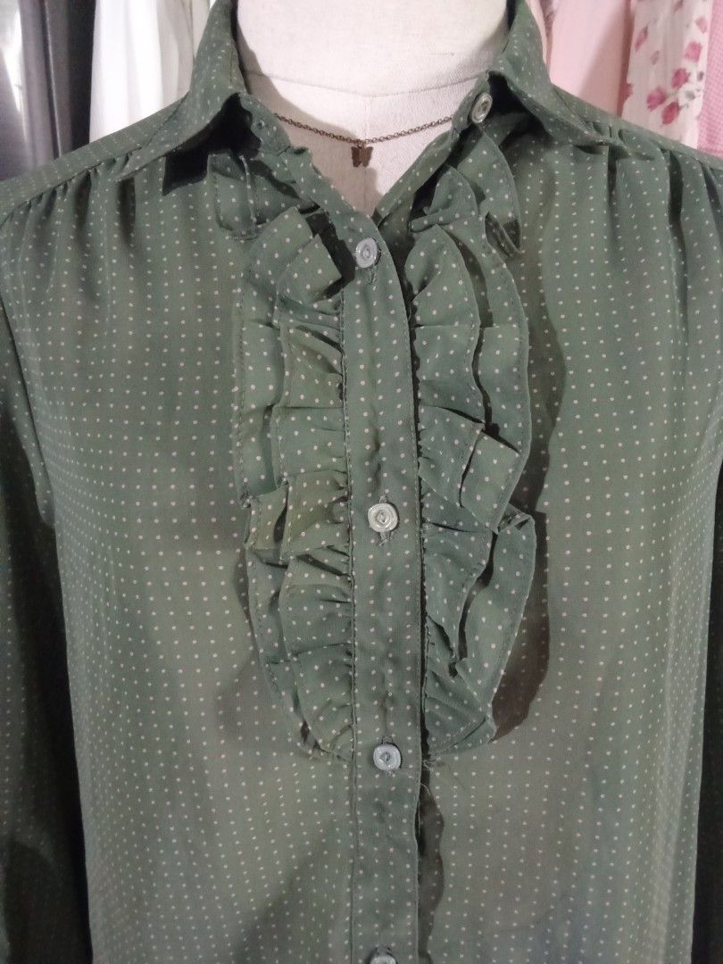 Green with pink polca dots ruffled top (Category: Longsleeves) located in Meycauayan. Submitted by midori021 (Listing ID 1461835777, Image 2). Description: thin fabric needs inner large.
