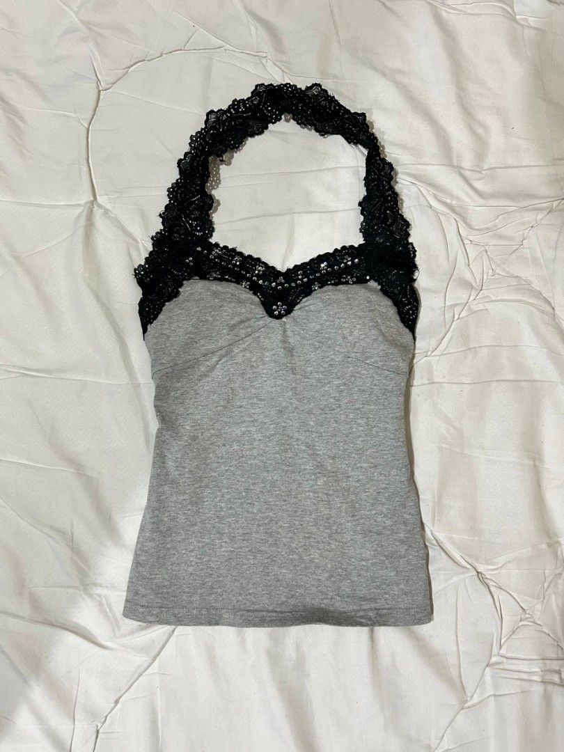 Grey Halter Top with Black Lace Trim (Category: Sleeveless) located in Caloocan City. Submitted by geliethrift_26 (Listing ID 1461804611, Image 1). Description: fits s-m, stratchable cotton fab no issue.