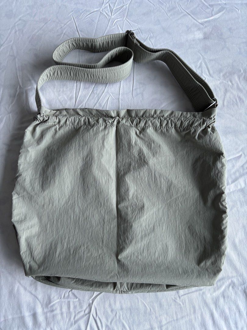 Gu Drawstring sling Bag (Category: Shoulder Bags) located in Makati City. Submitted by argelenfau89191 (Listing ID 1461844658, Image 2). Description: Still new and unused. Such a perfect bag for getaways and travel! ✈️.