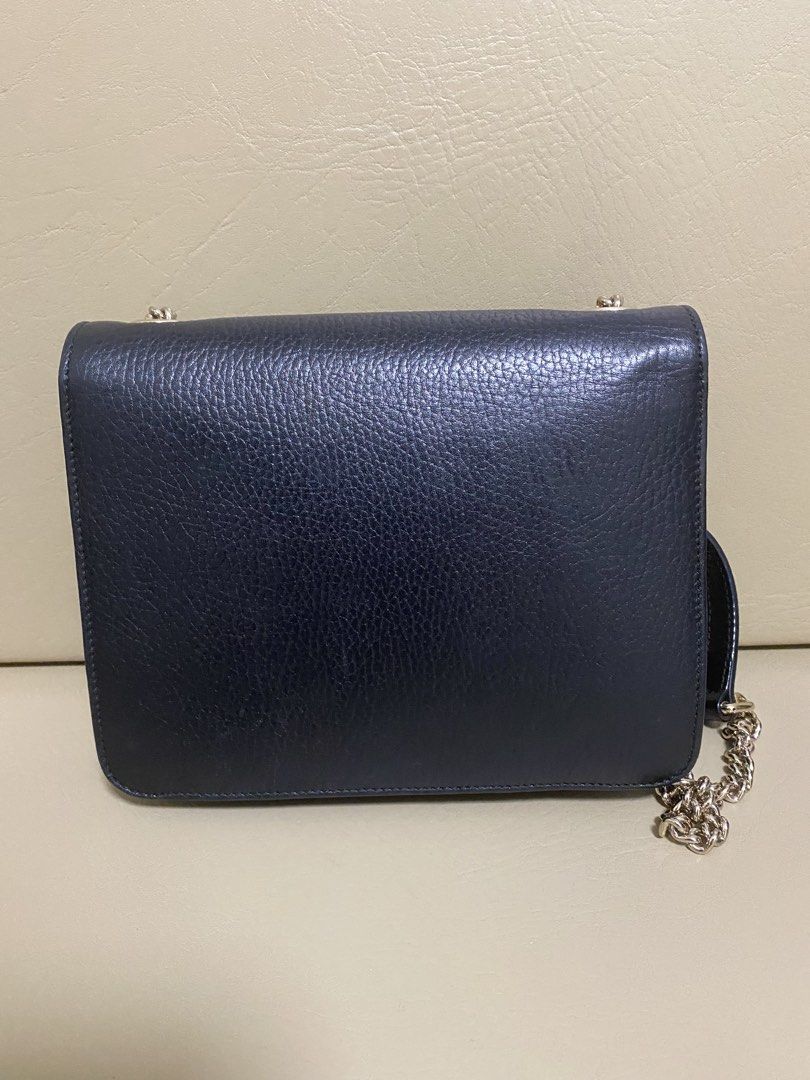 Gucci Black Leather Interlocking Chain Cross-body Bag (Category: Luxury Bags & Wallets) located in Manila. Submitted by aikara683 (Listing ID 1461977965, Image 2). Description: - Authentic Black Leather Gucci Marmont Bag - Iconic Gold GG Logo Hardware - Versatile Chain Strap - Serial Number clearly visible inside.