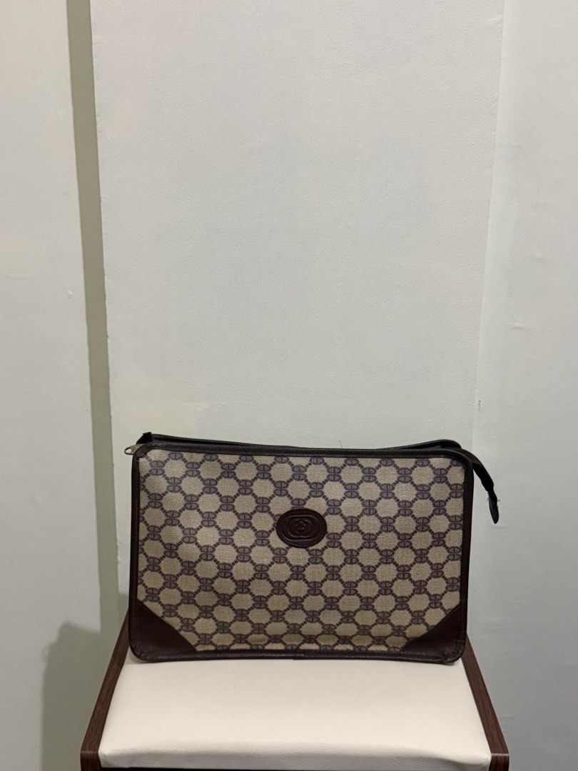 Gucci Clutch Bag (Category: Clutches) located in Cagayan de Oro. Submitted by soidee (Listing ID 1461907713, Image 1). Description: Gucci Vintage Clutch Bag rfs: not my style anymore Prices are negotiable .
