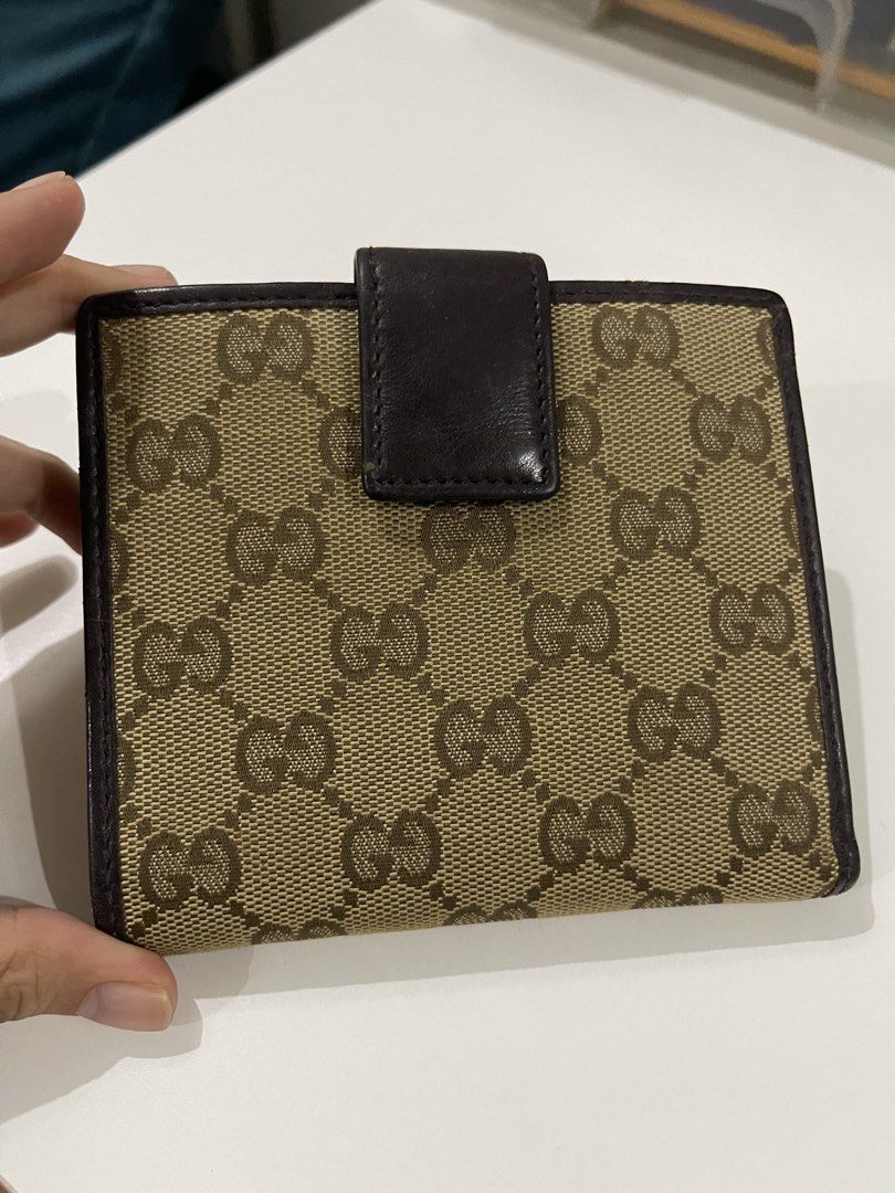 Gucci GG Monogram Canvas Bi-fold Wallet (Category: Luxury Bags & Wallets) located in Valenzuela. Submitted by dai.sukii (Listing ID 1461980724, Image 2). Description: Authentic Gucci GG monogram wallet. Brown leather trim, bi-fold with card slots & coin pocket. Minor wear on hardware/edges. Made in Italy. bought in Japan. Authentic Guaranteed negotiable.