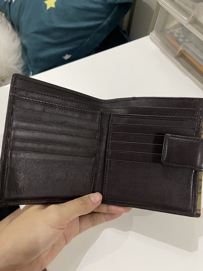 Gucci GG Monogram Canvas Bi-fold Wallet (Category: Luxury Bags & Wallets) located in Valenzuela. Submitted by dai.sukii (Listing ID 1461980724, Image 3). Description: Authentic Gucci GG monogram wallet. Brown leather trim, bi-fold with card slots & coin pocket. Minor wear on hardware/edges. Made in Italy. bought in Japan. Authentic Guaranteed negotiable.