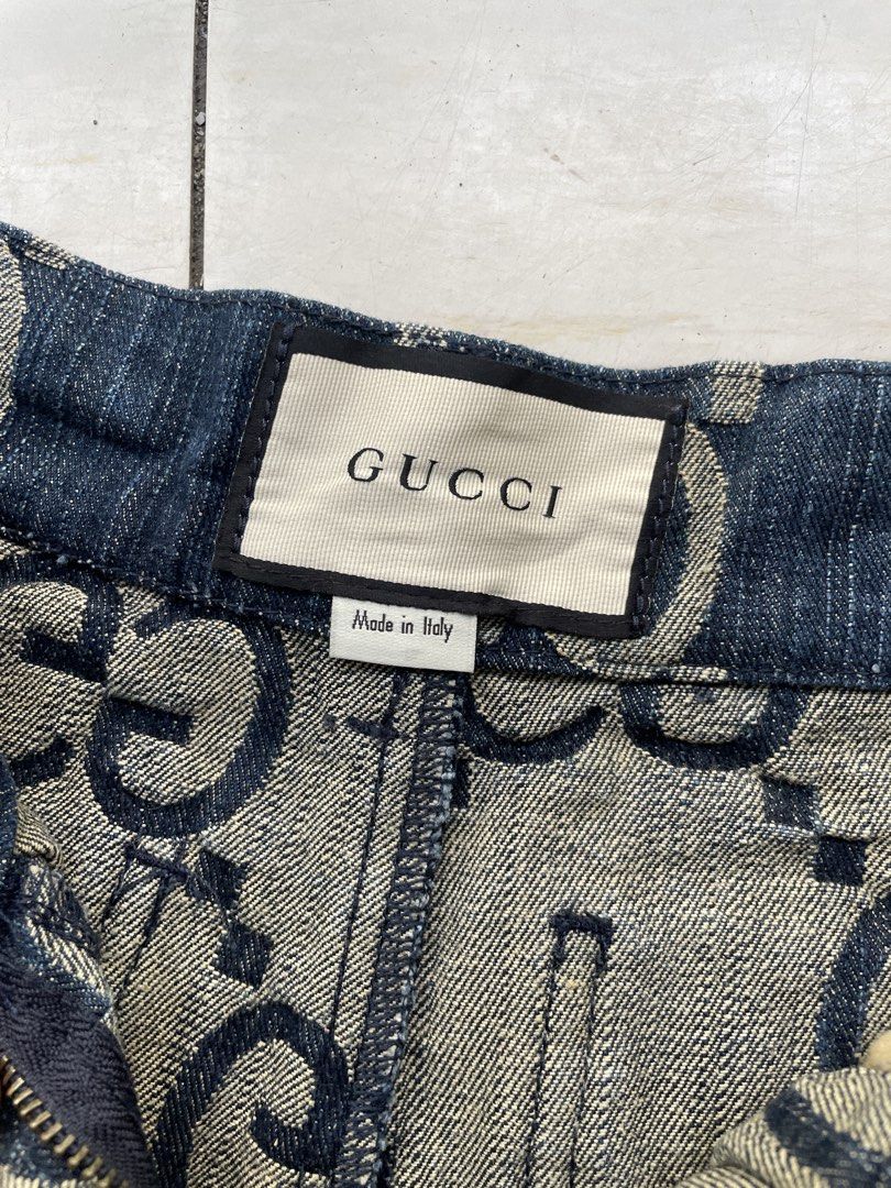 Gucci GG Monogram Denim Shorts (Category: Shorts) located in Manila. Submitted by cis_thrift143 (Listing ID 1461957600, Image 3). Description: - Authentic Gucci denim shorts - All-over GG monogram pattern - Made in Italy - Button and zip closure - Two back pockets with leather trim - Perfect statement piece for your wardrobe.