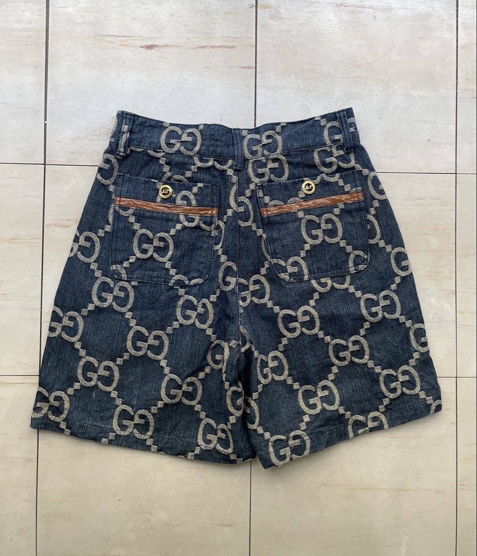 Gucci GG Monogram Denim Shorts (Category: Shorts) located in Manila. Submitted by cis_thrift143 (Listing ID 1461957600, Image 2). Description: - Authentic Gucci denim shorts - All-over GG monogram pattern - Made in Italy - Button and zip closure - Two back pockets with leather trim - Perfect statement piece for your wardrobe.
