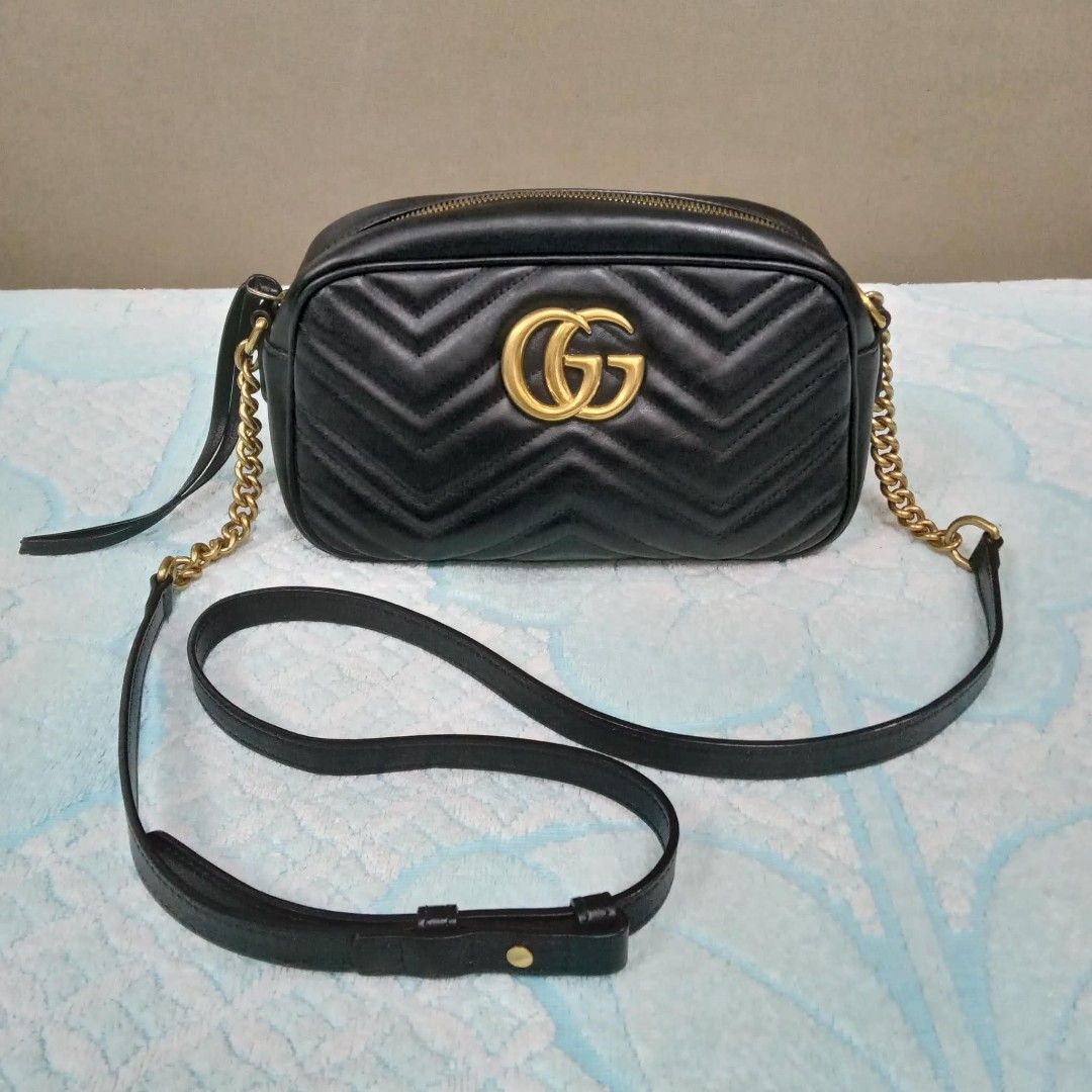Gucci Marmont Black Shoulder Bag (Category: Luxury Bags & Wallets) located in Taguig. Submitted by esa.agustin (Listing ID 1461812965, Image 1). Description: Original Gucci Marmont black shoulder/sling bag. With inclusions. Made in Italy..