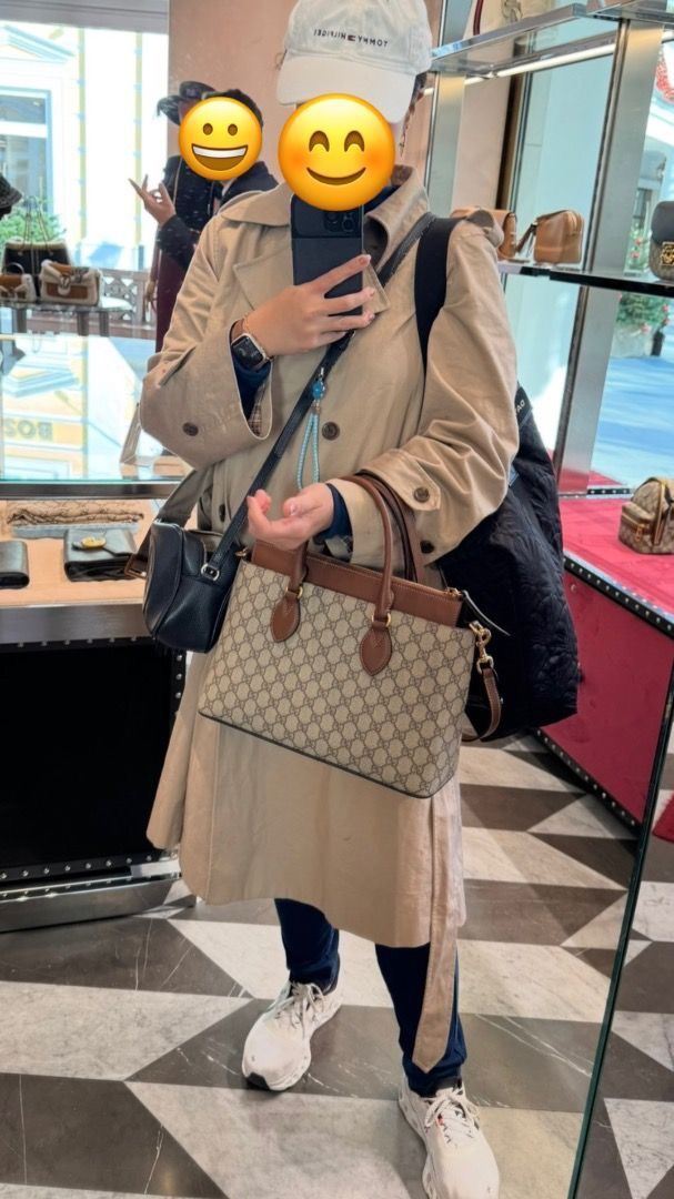 Gucci Monogram Canvas & Leather Top Handle Bag with Shoulder Strap (Category: Luxury Bags & Wallets) located in Paranaque City. Submitted by dhizay12 (Listing ID 1461910117, Image 2). Description: - Authentic Gucci GG monogram canvas - Brown leather trim - Top handles - Detachable shoulder strap - Zipper closure it's the perfect office bag, and perfect for everyday use! It features the iconic GG Coated canvas and smooth brown leather. The roomy i
