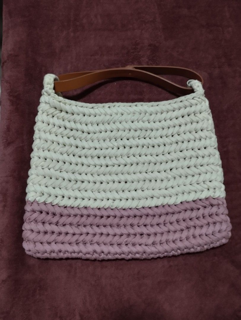 Handmade Crocheted Bag with Leather Straps (Category: Shoulder Bags) located in Mabalacat. Submitted by uniqlover (Listing ID 1461956682, Image 1). Description: - Cute handmade crocheted bag - Two-tone design: Pink and off-white - Sturdy leather straps - Ideal for everyday use or beach trips - Spacious for essentials - Unique, one-of-a-kind piece.