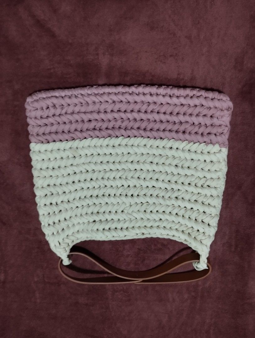 Handmade Crocheted Bag with Leather Straps (Category: Shoulder Bags) located in Mabalacat. Submitted by uniqlover (Listing ID 1461956682, Image 2). Description: - Cute handmade crocheted bag - Two-tone design: Pink and off-white - Sturdy leather straps - Ideal for everyday use or beach trips - Spacious for essentials - Unique, one-of-a-kind piece.