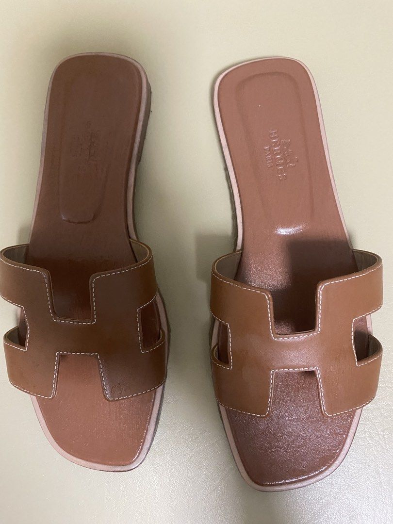 Hermes Oran - Brown size 37 (Category: Sneakers & Footwear) located in Manila. Submitted by aikara683 (Listing ID 1461971007, Image 2). Description: - Classic Hermes Oran sandals - Color: Brown - Material: Genuine Leather - Style: Easy slip-on - Versatile: Great for casual or dressing up - Iconic and a wardrobe staple - Selling because they are no longer my style - With sole protector - Authentic .