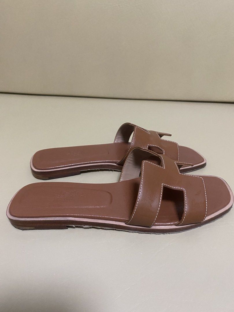 Hermes Oran - Brown size 37 (Category: Sneakers & Footwear) located in Manila. Submitted by aikara683 (Listing ID 1461971007, Image 3). Description: - Classic Hermes Oran sandals - Color: Brown - Material: Genuine Leather - Style: Easy slip-on - Versatile: Great for casual or dressing up - Iconic and a wardrobe staple - Selling because they are no longer my style - With sole protector - Authentic .
