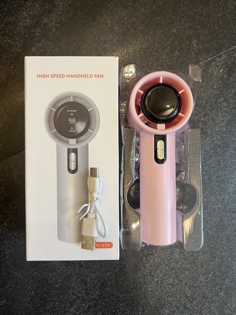 High Speed Handheld Fan Pink USB Rechargeable (Category: Fans) located in Pasig City. Submitted by yonghan0613 (Listing ID 1461908335, Image 1). Description: - USB rechargeable (cable included). .