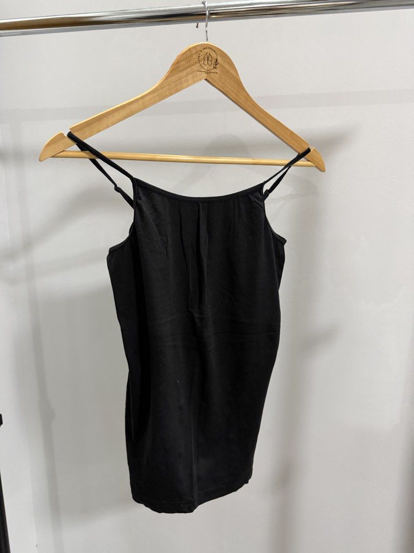 H&M Black Spaghetti Strap Camisole Top (Category: Sleeveless) located in Taguig. Submitted by dyaaanel (Listing ID 1461929956, Image 1). Description: 🖤 H&M Black Spaghetti Strap Camisole Top 🏷️ Brand: H&M 👗 Size: XS 🖤 Color: Black 🏷️ Condition: Pre-loved, good condition 📸 Actual photos for reference. RFS: Decluttering unused and slightly used clothes. Disclaimer: some items are pre-loved unless stated otherwise. Please manage your expectati