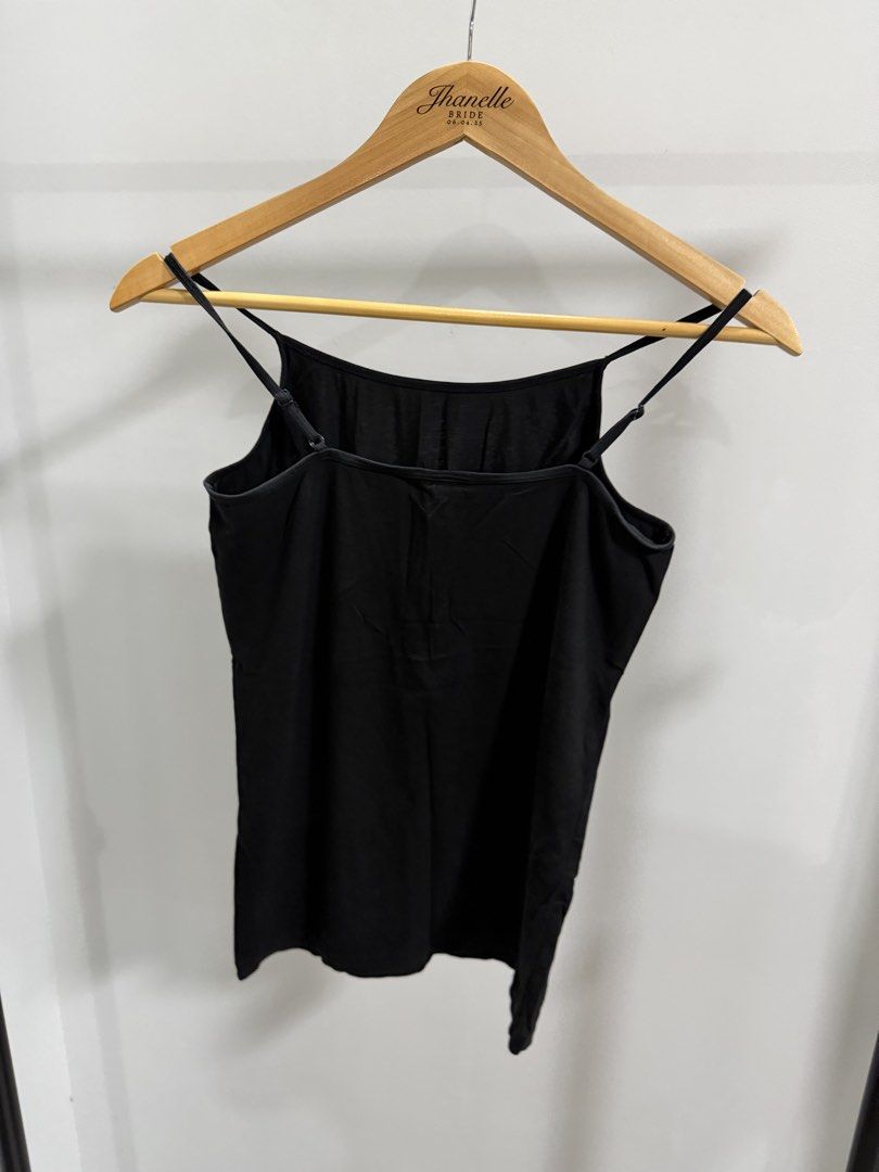 H&M Black Spaghetti Strap Camisole Top (Category: Sleeveless) located in Taguig. Submitted by dyaaanel (Listing ID 1461929956, Image 2). Description: 🖤 H&M Black Spaghetti Strap Camisole Top 🏷️ Brand: H&M 👗 Size: XS 🖤 Color: Black 🏷️ Condition: Pre-loved, good condition 📸 Actual photos for reference. RFS: Decluttering unused and slightly used clothes. Disclaimer: some items are pre-loved unless stated otherwise. Please manage your expectati