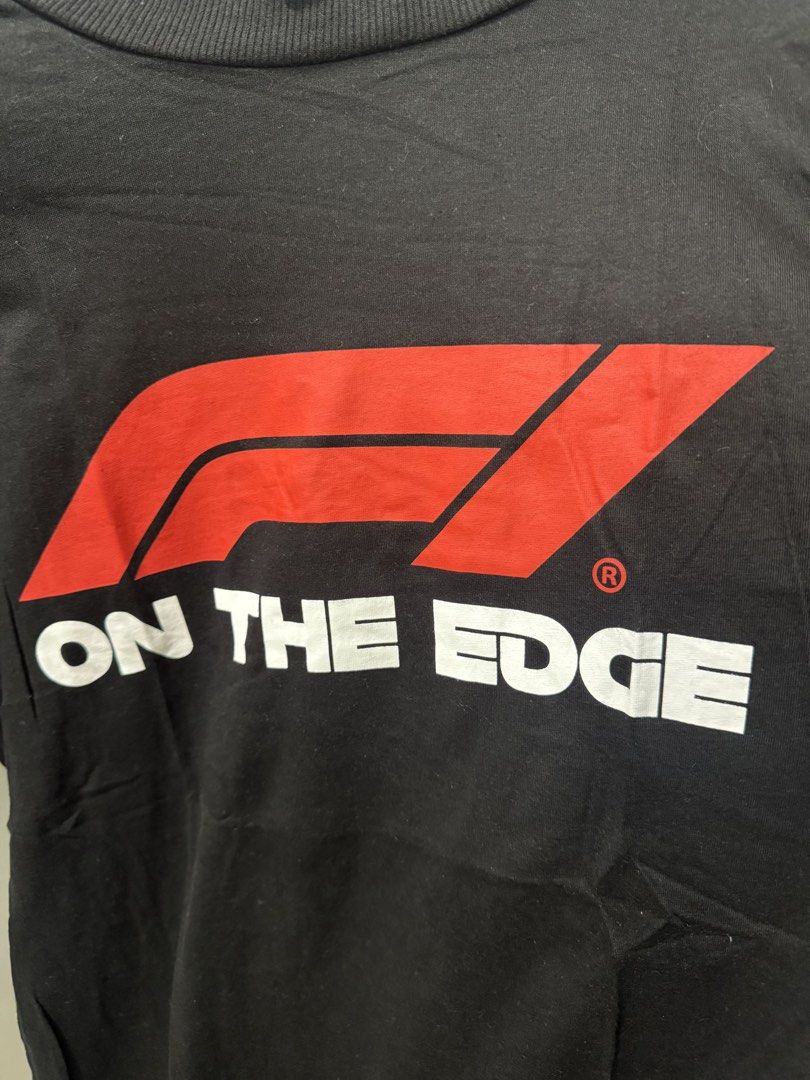 H&M Divided Formula 1 "On The Edge" Oversized Tee XS (Fits Medium) (Category: Shirts) located in Taguig. Submitted by jdeclutterist (Listing ID 1461983584, Image 2). Description: H&M Divided (Authentic Formula 1 Collab) - XS on tag but Oversized fit, parang Medium and sukat kaya maluwag talaga - 9.5/10 Once worn, no stains, no lint, and completely black (hindi kupas) - Bold Logo font graphic. Perfect for F1 girlies who love oversized streetwear l