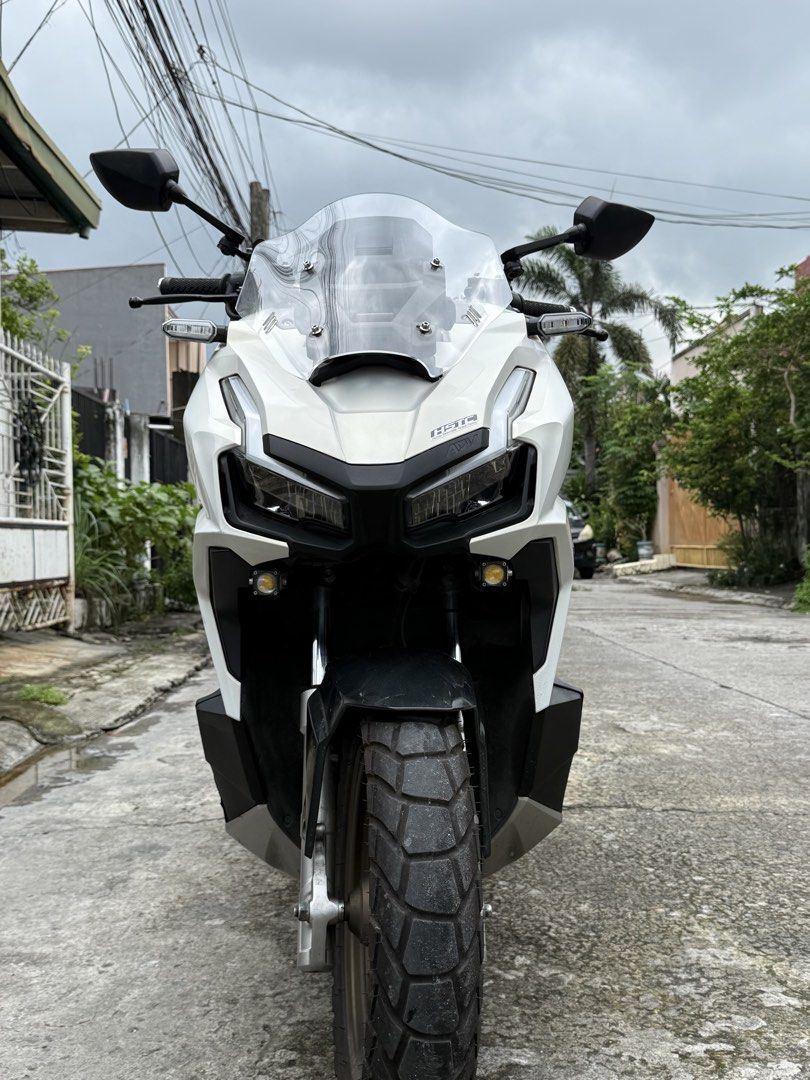 Honda ADV160 Scooter - White (Category: Motorbikes for Sale) located in Bacoor. Submitted by bernardjustine (Listing ID 1461805981, Image 3). Description: ‼️FOR SALE‼️ Honda ADV 160 2023 model * 16k plus original odo * Registered until 2028 * Original LTO Plate number * All stock engine * No history of accident * Fresh and well maintained! * Newly change engine oil and gear oil * Newly cleaned CVT * New spark plug * New air filter * Makinis pwede