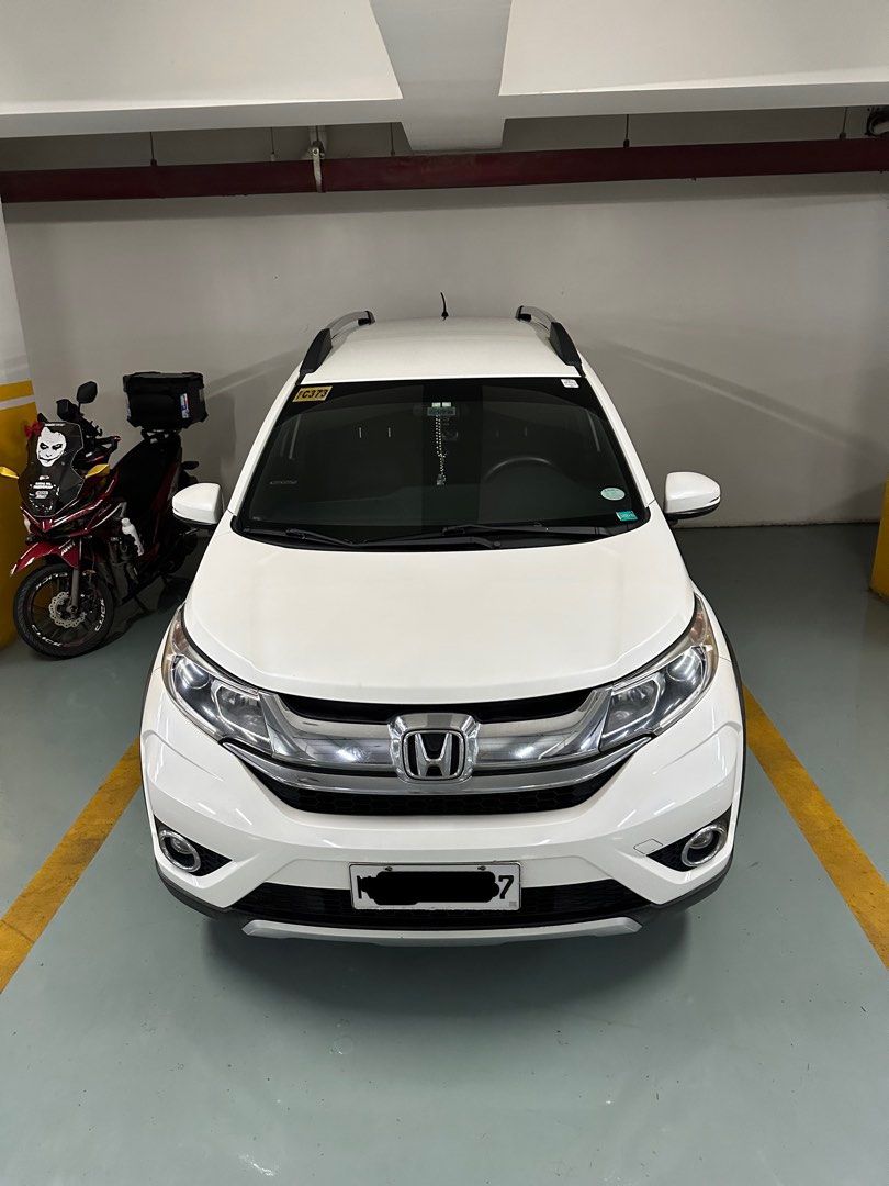 Honda BR-V (Category: Used Cars) located in Santa Rosa. Submitted by mamayeye (Listing ID 1461959724, Image 1). Description: Used HONDA BRV 2018 model TOP OF THE LINE Color➡️Pearl white Leather ➡️black ODO➡️less than 40,000 7-8 seaters PMS at Honda cars Makati (sept 15,2026) LTO Register 2026 Fully paid CLEAN TITLE READY TO TRANSFER ❌HINDI NABAHA! ❌HINDI NAAKSIDENTE! VERY GOOD CONDITION LOCATION INDANG CAVITE .