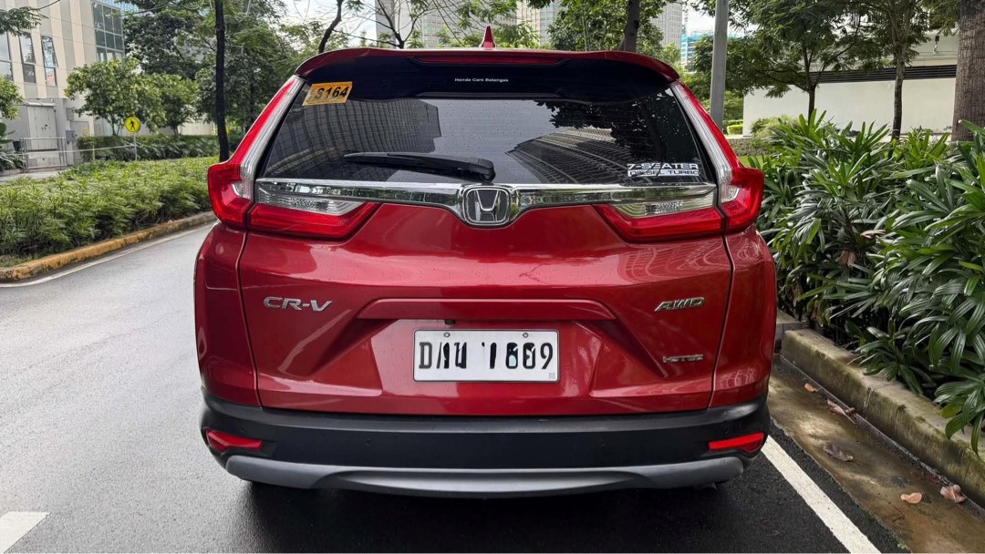 Honda CR-V SX AWD Auto (Category: Used Cars) located in Manila. Submitted by quality_cars (Listing ID 1461952516, Image 3). Description: FOR SALE‼️ 2019 Honda CR-V SX Diesel AWD • ✅ Trade-in and in-house financing Price: 975,000 • 1.6L i-DTEC turbo diesel engine • 9-speed automatic transmission • Real Time AWD • 7-seater configuration • Honda SENSING • Drive modes: ECON and Normal • Paddle shifters • Panoramic sunroof • Power tailgate • Leather i