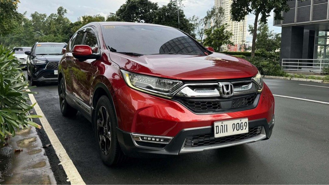 Honda CR-V SX AWD Auto (Category: Used Cars) located in Manila. Submitted by quality_cars (Listing ID 1461952516, Image 2). Description: FOR SALE‼️ 2019 Honda CR-V SX Diesel AWD • ✅ Trade-in and in-house financing Price: 975,000 • 1.6L i-DTEC turbo diesel engine • 9-speed automatic transmission • Real Time AWD • 7-seater configuration • Honda SENSING • Drive modes: ECON and Normal • Paddle shifters • Panoramic sunroof • Power tailgate • Leather i