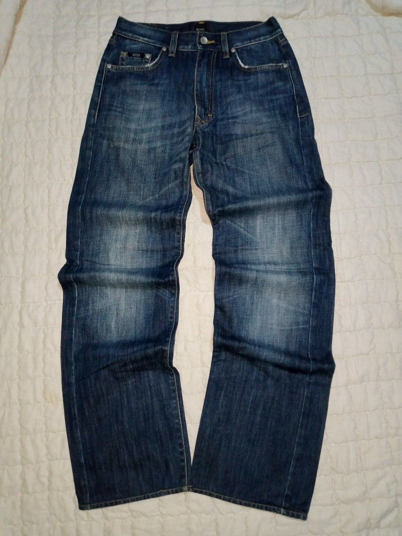 HUGO BOSS Denim Jeans (Category: Jeans) located in Allen. Submitted by milyonaryung_gipit (Listing ID 1461852872, Image 1). Description: - Classic blue denim jeans from HUGO BOSS - Straight leg fit - Button fly closure - reSize 28-29 - Length 41 - Two front and two back pockets - Subtle distressing for a worn-in, casual look.
