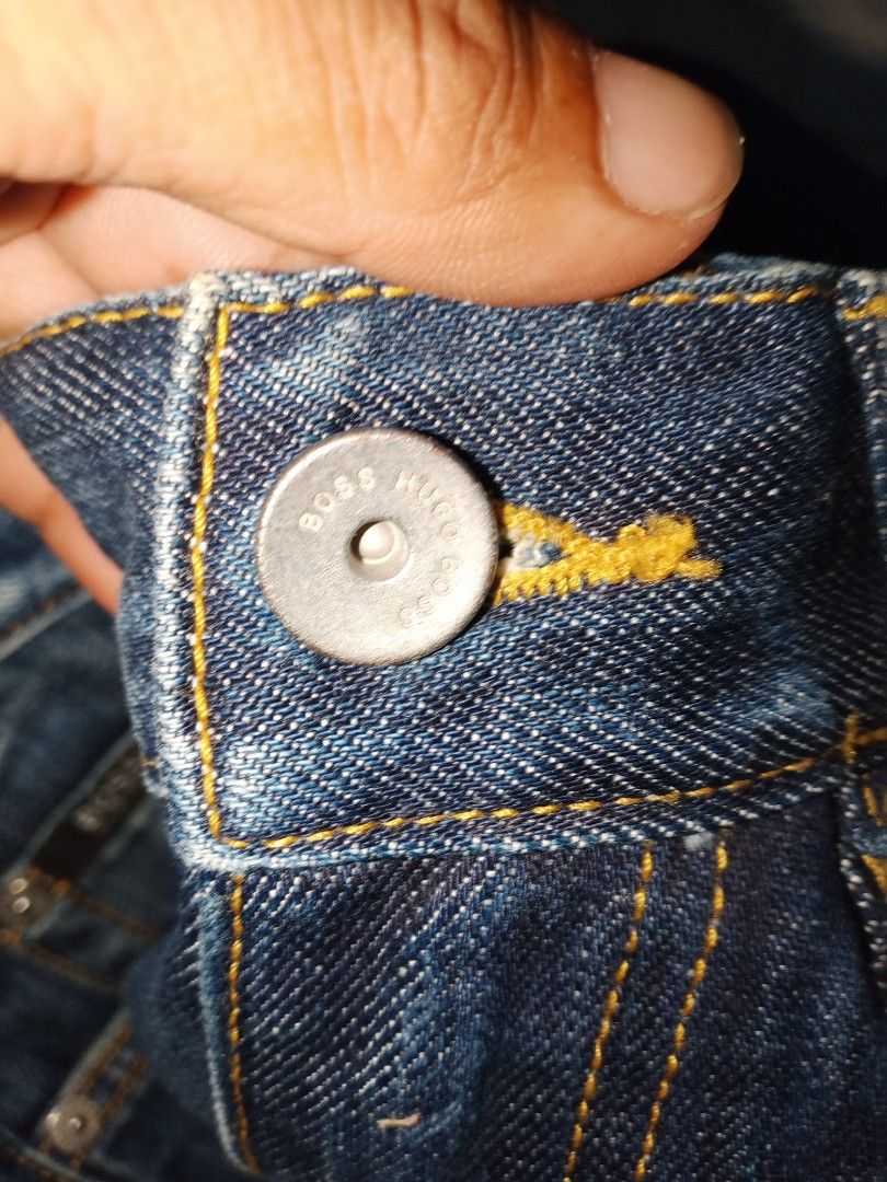 HUGO BOSS Denim Jeans (Category: Jeans) located in Allen. Submitted by milyonaryung_gipit (Listing ID 1461852872, Image 3). Description: - Classic blue denim jeans from HUGO BOSS - Straight leg fit - Button fly closure - reSize 28-29 - Length 41 - Two front and two back pockets - Subtle distressing for a worn-in, casual look.